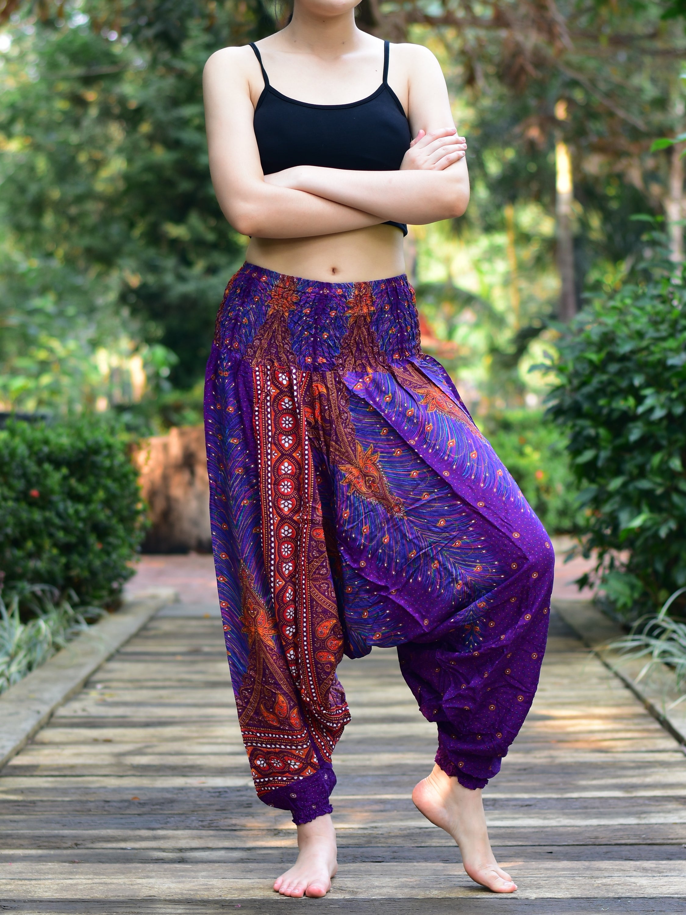 Bohotusk Purple Peacock Moonshine Low Crotch Harem Pants for women, showcasing vibrant colors and unique design, perfect for yoga and lounging.